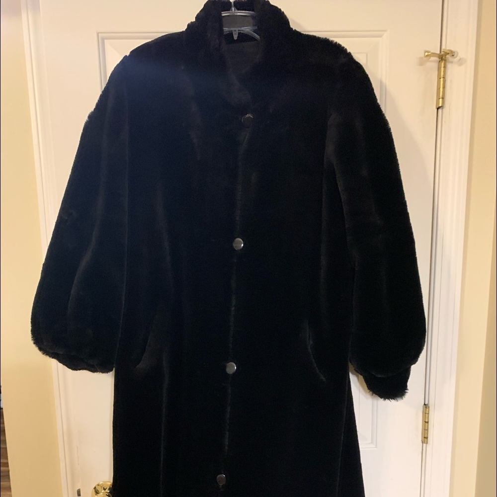 Reversible Faux fur coat! This a great versatile coat!